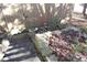 Fenced yard features landscaping with stone steps and rock walls at 2335 Corbett Ct, Powder Springs, GA 30127
