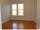 Bedroom with hardwood floors and window at 2335 Corbett Ct, Powder Springs, GA 30127
