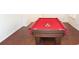 Bright recreation room featuring a pool table with a red felt and hardwood floor at 2335 Corbett Ct, Powder Springs, GA 30127