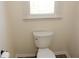 Close-up of toilet and nearby window at 2335 Corbett Ct, Powder Springs, GA 30127