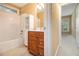 Bathroom featuring shower, vanity with ample cabinet space, and neutral walls at 3928 Herron Sw Ln, Atlanta, GA 30349