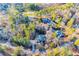 Breathtaking aerial view of a private estate nestled among lush greenery and mature trees at 7364 N Mitchell N Ct, Villa Rica, GA 30180
