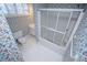 Bathroom featuring floral wallpaper, a toilet, and a shower at 7364 N Mitchell N Ct, Villa Rica, GA 30180