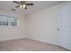 Bright bedroom with a ceiling fan and a large window at 7364 N Mitchell N Ct, Villa Rica, GA 30180