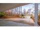 Long driveway with a great view of the yard and entrance to the two car garage at 7364 N Mitchell N Ct, Villa Rica, GA 30180