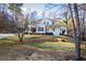 Lovely two-story home with a welcoming front porch and landscaped front yard at 7364 N Mitchell N Ct, Villa Rica, GA 30180