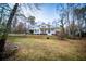 Beautiful home with large front yard, complimented by mature trees at 7364 N Mitchell N Ct, Villa Rica, GA 30180