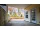Back patio providing a serene outdoor space with a door leading to the interior at 7364 N Mitchell N Ct, Villa Rica, GA 30180
