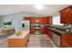 Modern kitchen features stainless steel appliances and center island at 1946 Taffeta Trl, Lithonia, GA 30058