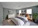 Serene bedroom with neutral tones, soft lighting, and stylish decor at 1946 Taffeta Trl, Lithonia, GA 30058