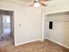 Bedroom featuring hardwood floors, fresh paint, closet and an open doorway to another room at 2348 Jones Nw Rd, Atlanta, GA 30318