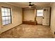 Bedroom with hardwood floors, fresh paint, closet, cabinets and a large window for natural light at 2348 Jones Nw Rd, Atlanta, GA 30318