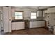 Bright kitchen with new white cabinets and dark countertops ready for appliances and personal touches to make it your own at 2348 Jones Nw Rd, Atlanta, GA 30318