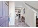 Inviting foyer with marble tile floors, staircase, and view into the living spaces at 2411 Heritage Park Nw Cir # 14, Kennesaw, GA 30144