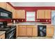 Well-equipped kitchen featuring modern appliances, ample countertop space, and storage at 2411 Heritage Park Nw Cir # 14, Kennesaw, GA 30144