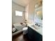 A modern bathroom featuring a freestanding tub, separate shower, and stylish fixtures at 1670 Rogers Sw Ave, Atlanta, GA 30310