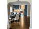 Open concept dining room featuring hardwood floors and stylish decor throughout at 1670 Rogers Sw Ave, Atlanta, GA 30310