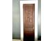 A stained wood door with brass knob and white trim, adding charm to the interior at 1670 Rogers Sw Ave, Atlanta, GA 30310