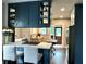 Modern kitchen boasts custom cabinetry, stainless steel appliances, and an island at 1670 Rogers Sw Ave, Atlanta, GA 30310