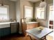 Bright kitchen area with granite counters, natural wood cabinets, and stainless steel appliances at 1670 Rogers Sw Ave, Atlanta, GA 30310