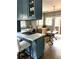 Stylish kitchen with granite countertops, stainless steel appliances, and a gas cooktop at 1670 Rogers Sw Ave, Atlanta, GA 30310