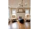Stylish living room with hardwood floors, a decorative fireplace, and elegant furnishings at 1670 Rogers Sw Ave, Atlanta, GA 30310