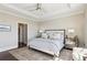Comfortable bedroom featuring an area rug, stylish decor, and ample natural light at 2700 Paces Ferry Se Rd # 302, Atlanta, GA 30339