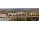 Scenic view from a balcony with lush greenery and a distant city skyline at 2700 Paces Ferry Se Rd # 302, Atlanta, GA 30339