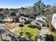 An aerial shot capturing the neighborhood's layout, showcasing the neatly arranged homes, and the surrounding lush trees at 2734 Skyland Ne Dr, Brookhaven, GA 30319