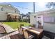 Backyard featuring a dining area and well-manicured lawn at 2734 Skyland Ne Dr, Brookhaven, GA 30319