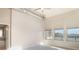 Bedroom with large windows, neutral carpet, and industrial style exposed ductwork at 3820 Roswell Ne Rd # 317, Atlanta, GA 30342