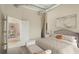 Stylishly decorated bedroom with neutral tones, plush bedding, and exposed ductwork creates a serene atmosphere at 3820 Roswell Ne Rd # 317, Atlanta, GA 30342