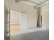 Cozy bedroom with natural light, neutral walls, and views to another room at 3820 Roswell Ne Rd # 317, Atlanta, GA 30342