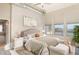 Relaxing bedroom with large windows, neutral decor, and an ensuite bathroom at 3820 Roswell Ne Rd # 317, Atlanta, GA 30342
