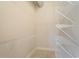 Walk-in closet with white shelving, providing ample storage space at 3820 Roswell Ne Rd # 317, Atlanta, GA 30342
