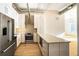 Chic kitchen featuring stainless appliances, white cabinets, and hardwood floors at 3820 Roswell Ne Rd # 317, Atlanta, GA 30342