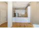 Modern kitchen with white cabinets, stainless steel appliances, and a unique backsplash at 3820 Roswell Ne Rd # 317, Atlanta, GA 30342