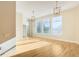 Bright living room with large windows, hardwood floors, and contemporary lighting at 3820 Roswell Ne Rd # 317, Atlanta, GA 30342