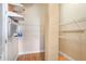 Walk-in pantry with wood floor, white wire shelving, and utility connections at 3820 Roswell Ne Rd # 317, Atlanta, GA 30342