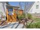 Backyard with steps to deck, patio and stone paver pathway through the garden at 965 Carr Nw St, Atlanta, GA 30318