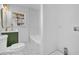 Updated bathroom features modern fixtures, stylish vanity, and shower-tub combo at 965 Carr Nw St, Atlanta, GA 30318