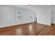 Bright bedroom boasts hardwood floors, neutral walls, and ample natural light from dual windows at 965 Carr Nw St, Atlanta, GA 30318