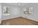 Bright bedroom with hardwood floors and natural light streaming through the windows at 965 Carr Nw St, Atlanta, GA 30318