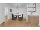 Cozy dining area featuring modern lighting, seating for two, and stylish serving bar at 965 Carr Nw St, Atlanta, GA 30318
