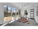 Sunroom features large windows and light interior, ideal for a home office or relaxation space at 965 Carr Nw St, Atlanta, GA 30318