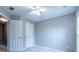 Bedroom features neutral paint, carpet, two doors and a window at 271 Balaban Cir, Woodstock, GA 30188