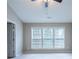 Spacious bedroom is well-lit by three large windows at 271 Balaban Cir, Woodstock, GA 30188