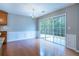 Dining area with wainscoting and sliding glass doors to the outdoors at 271 Balaban Cir, Woodstock, GA 30188