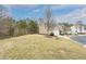 Traditional two-story home with a two-car garage, manicured lawn, and lush landscaping on a large lot at 271 Balaban Cir, Woodstock, GA 30188