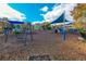 View of playground with swings, slides, and climbing structures at 271 Balaban Cir, Woodstock, GA 30188